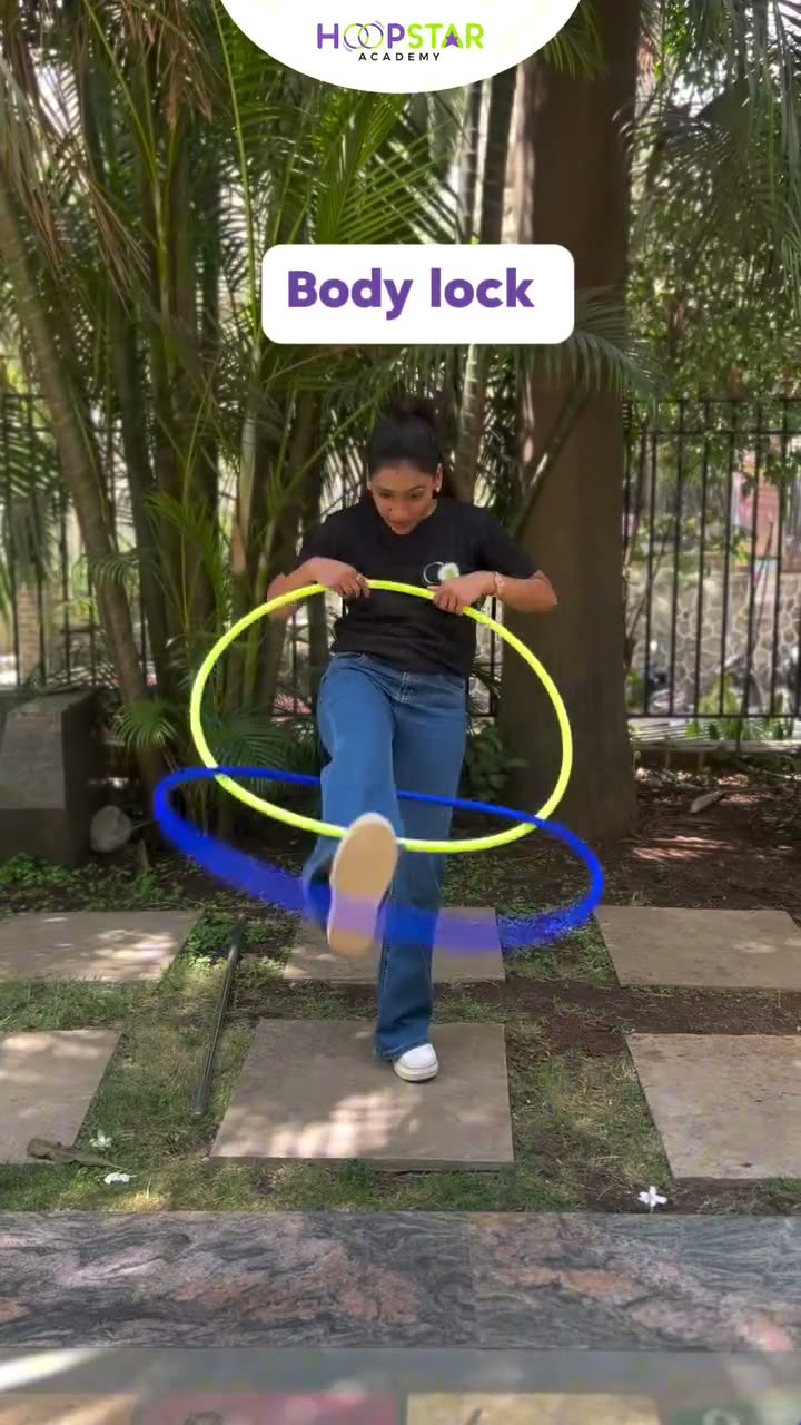 A child demonstrating Body Lock — a Level 7 hula hoop skill