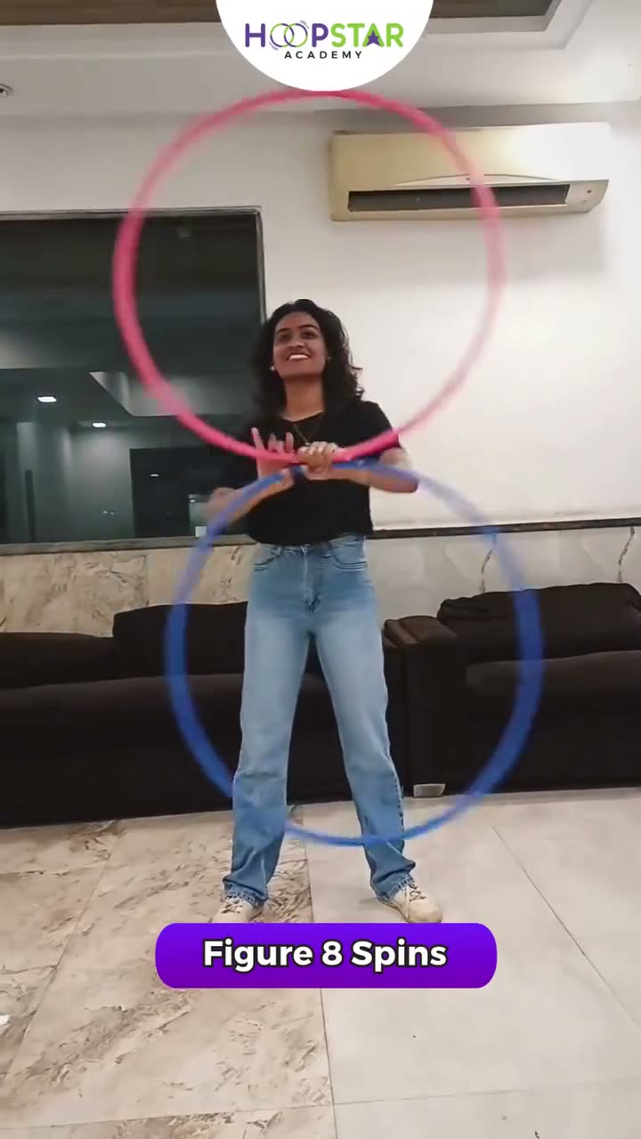 A child demonstrating Figure 8 Spins — a Level 3 hula hoop skill