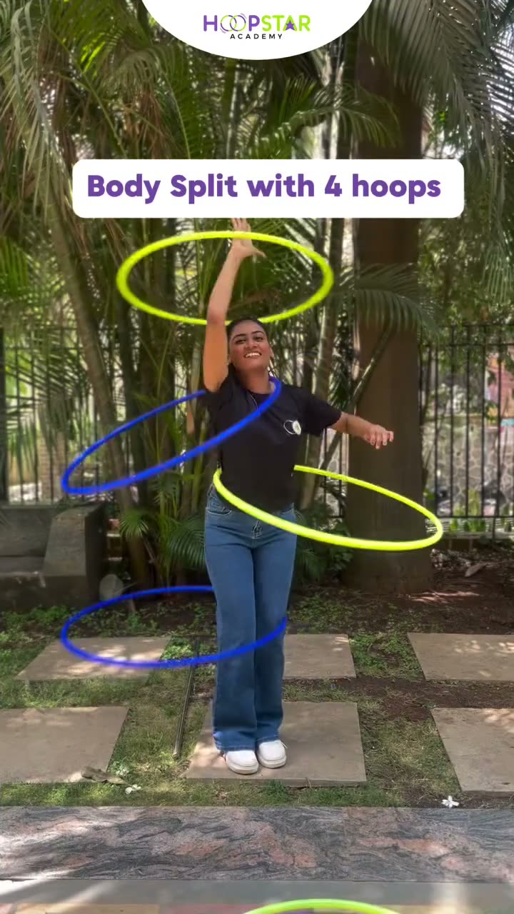 A child demonstrating Four Hoop Body Split — a Level 7 hula hoop skill