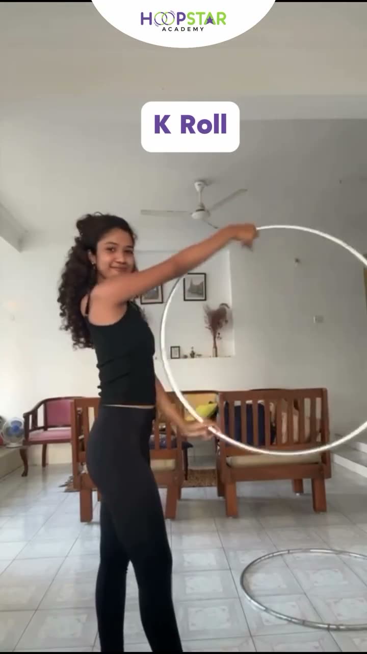 A child demonstrating K-Rools — a Level 5 hula hoop skill