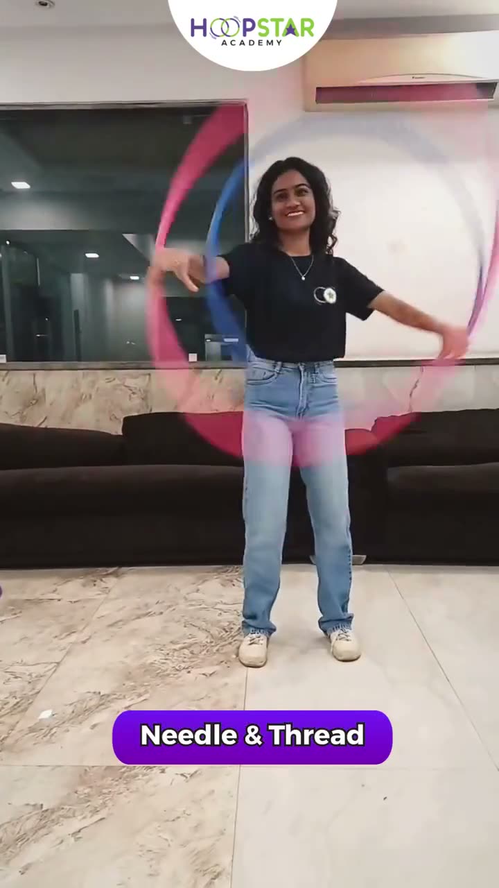 A child demonstrating Needle & Thread — a Level 3 hula hoop skill