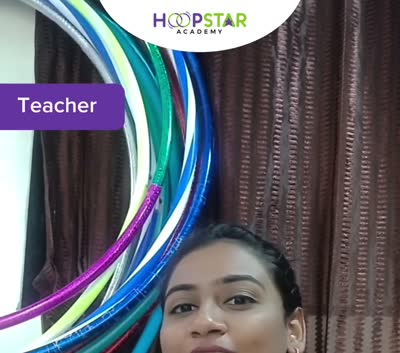 A HoopStar hula hoop coach