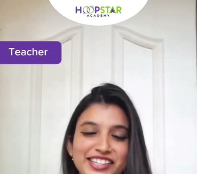 A HoopStar hula hoop coach
